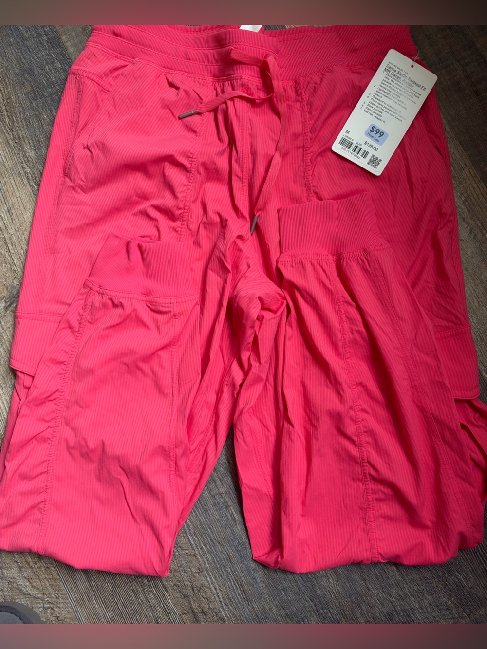 Lulu lemon pink dance studio relaxed for MR cargo jogger. Size M. NWT.